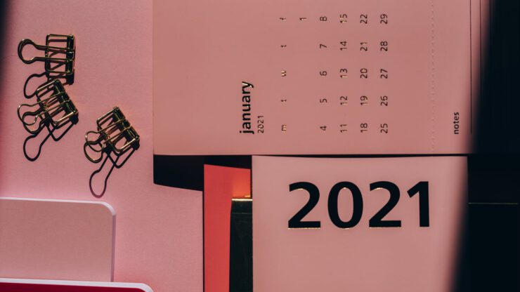 modern agenda with monthly calendar near clips